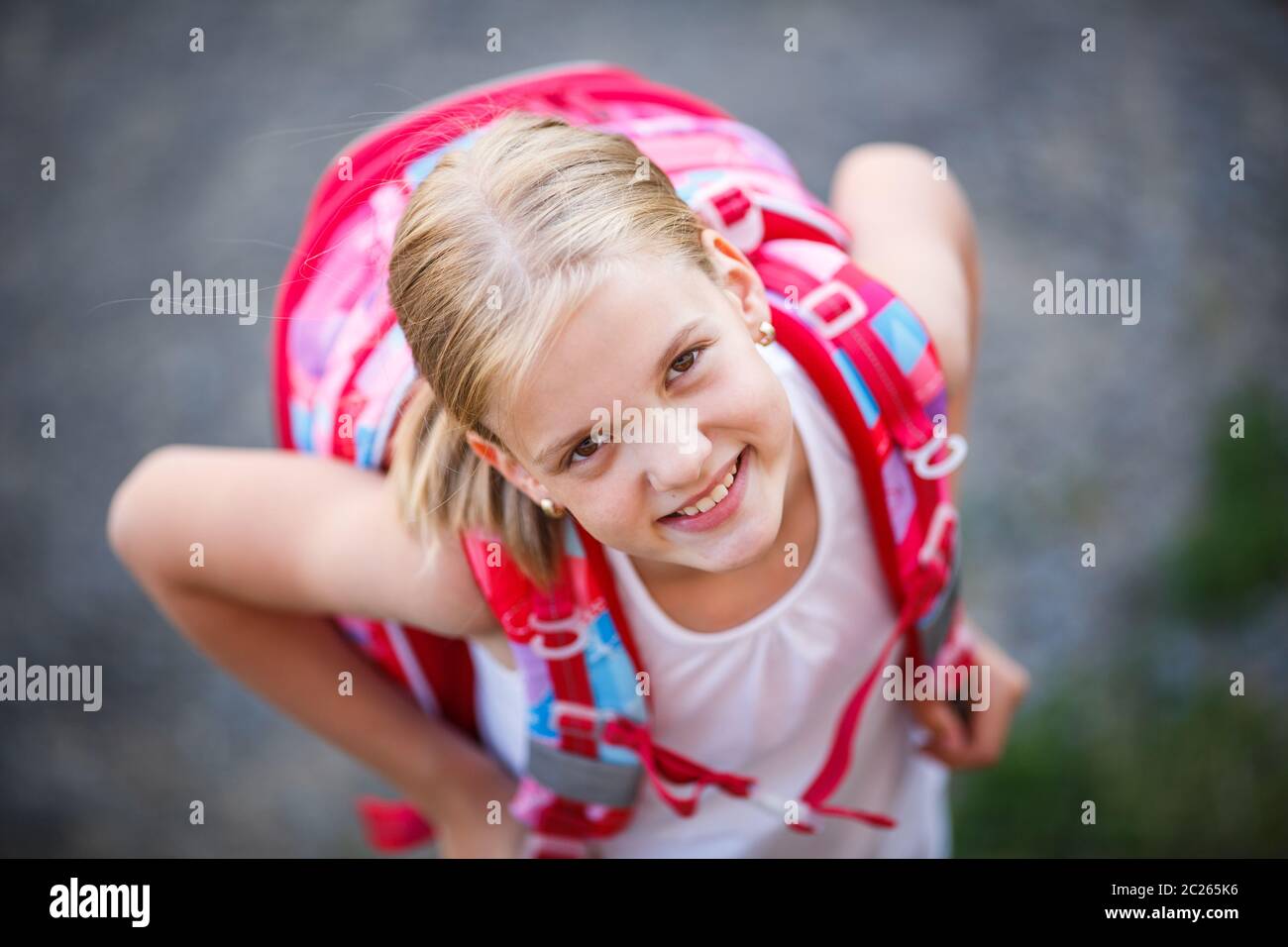 cute-little-girl-going-home-from-school-looking-well-before-crossing