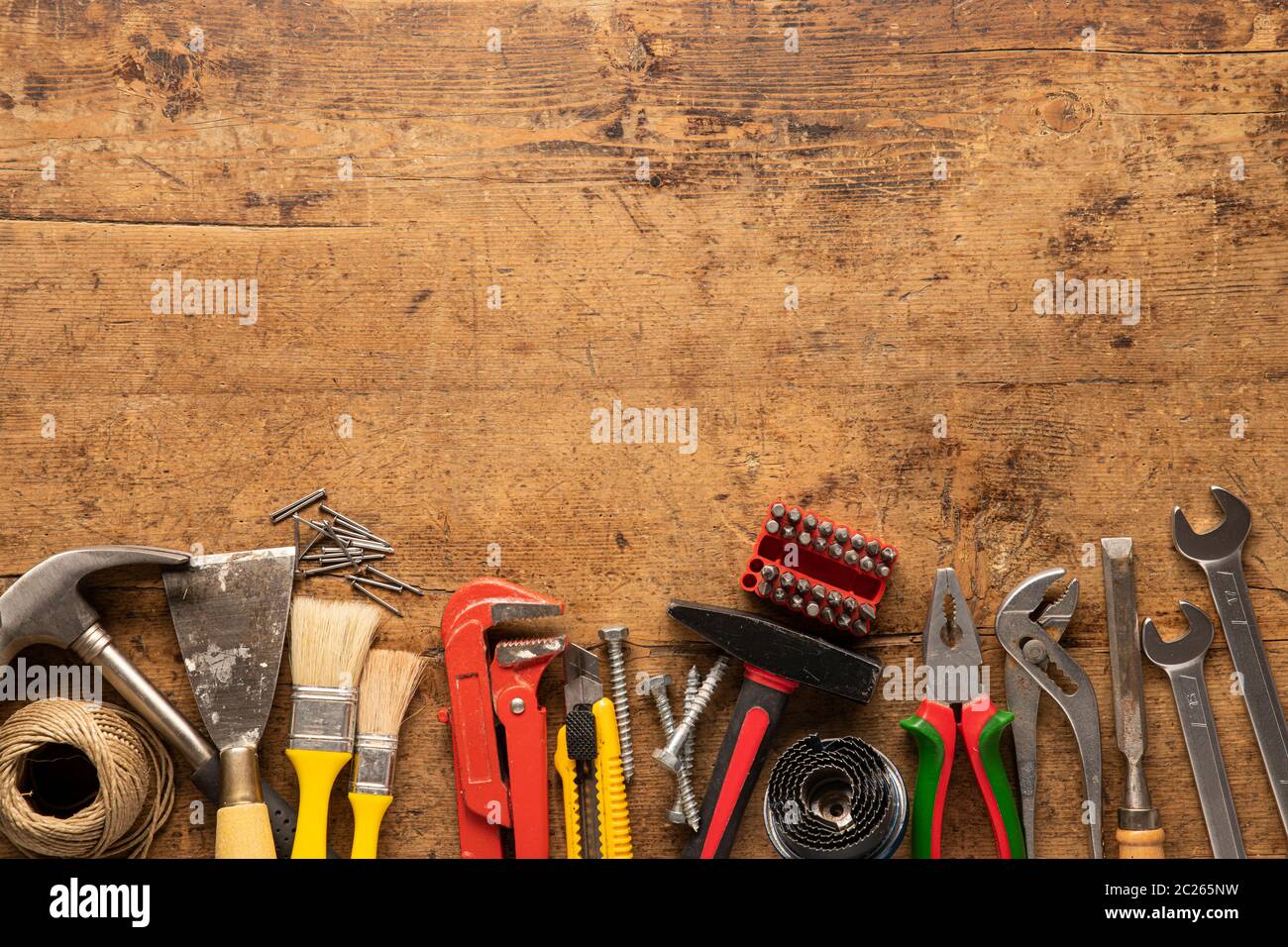 Many tools on a wooden vintage background Stock Photo