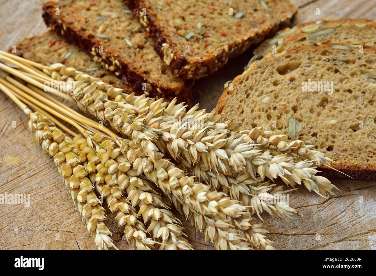Top view of sliced wholegrain bread on a wooden table Stock Photo - Alamy