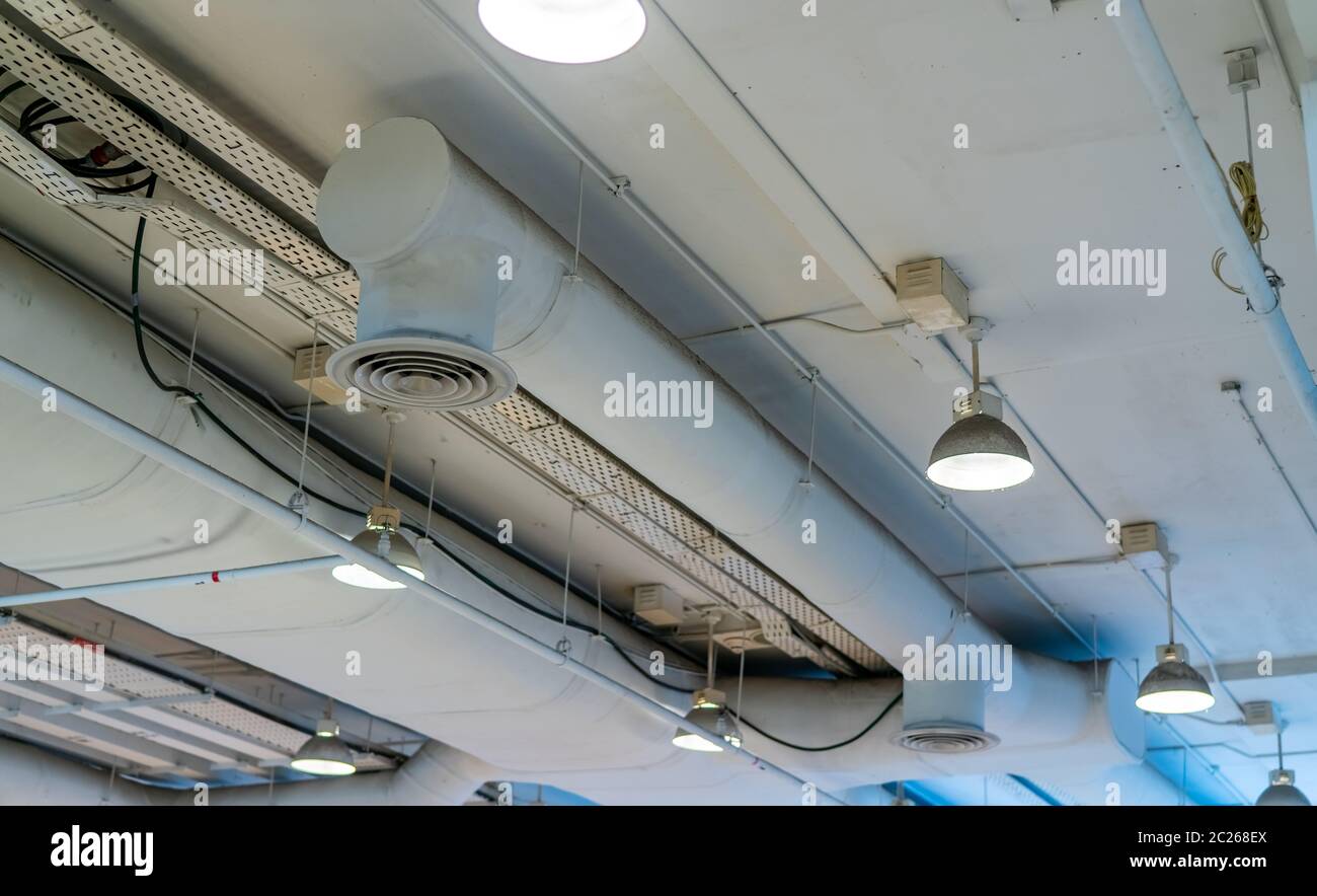 Air duct, wiring and plumbing in the mall. Air conditioner pipe, wiring