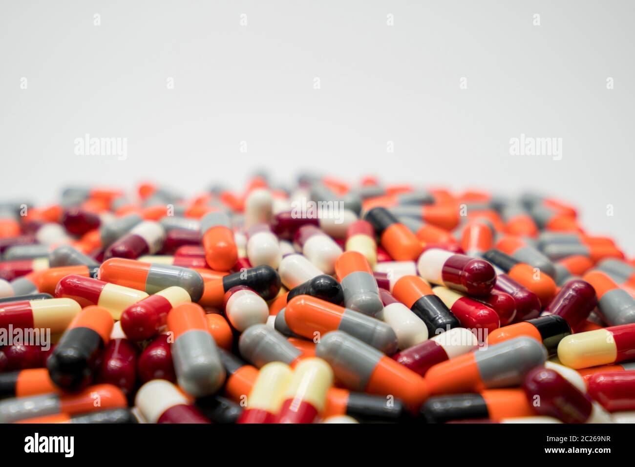 Pile of colorful antibiotic capsule pills. Pharmaceutical industry