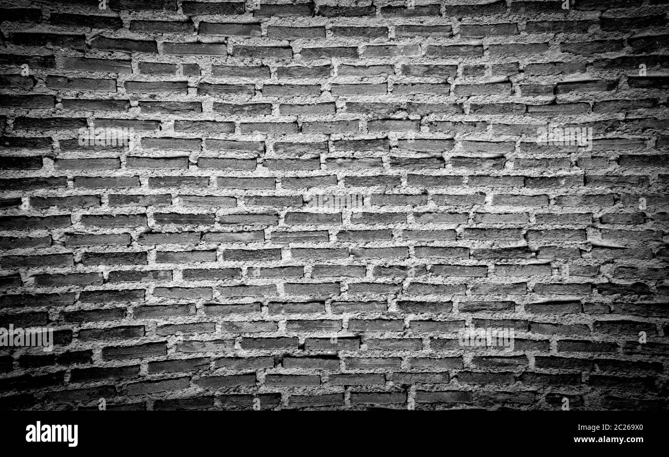 Black and white brick wall background with copy space Stock Photo - Alamy