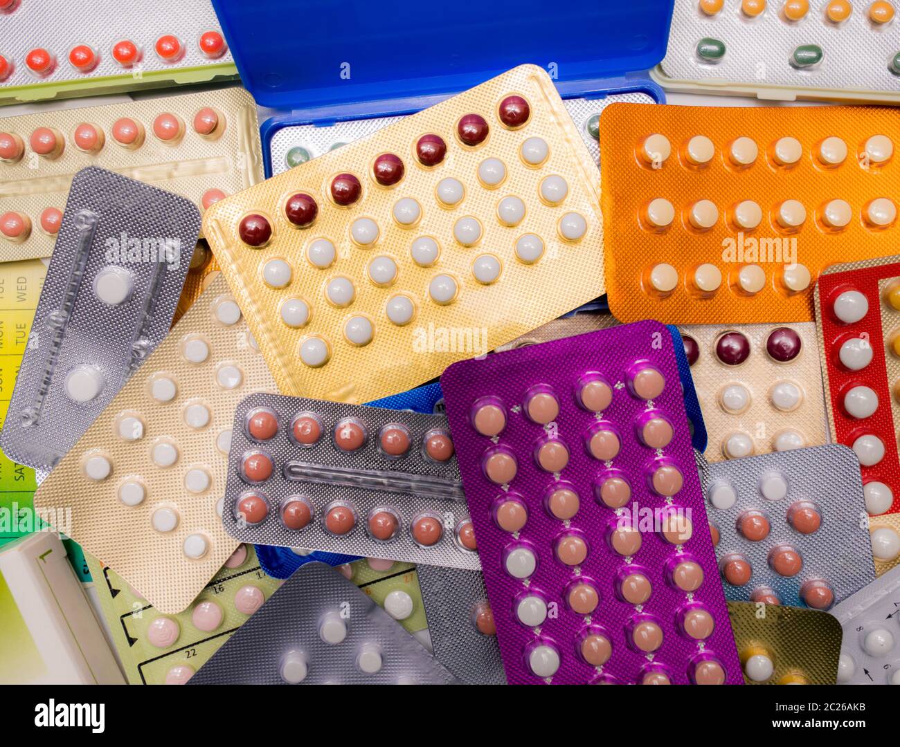 Top view pile of contraceptive pills in blister pack. Birth control pills. Family planning. Woman hormones tablet pills. Hormone replacement therapy. Stock Photo