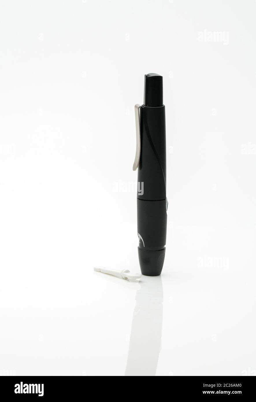 Lancing pen device isolated on white background with copy space Stock Photo