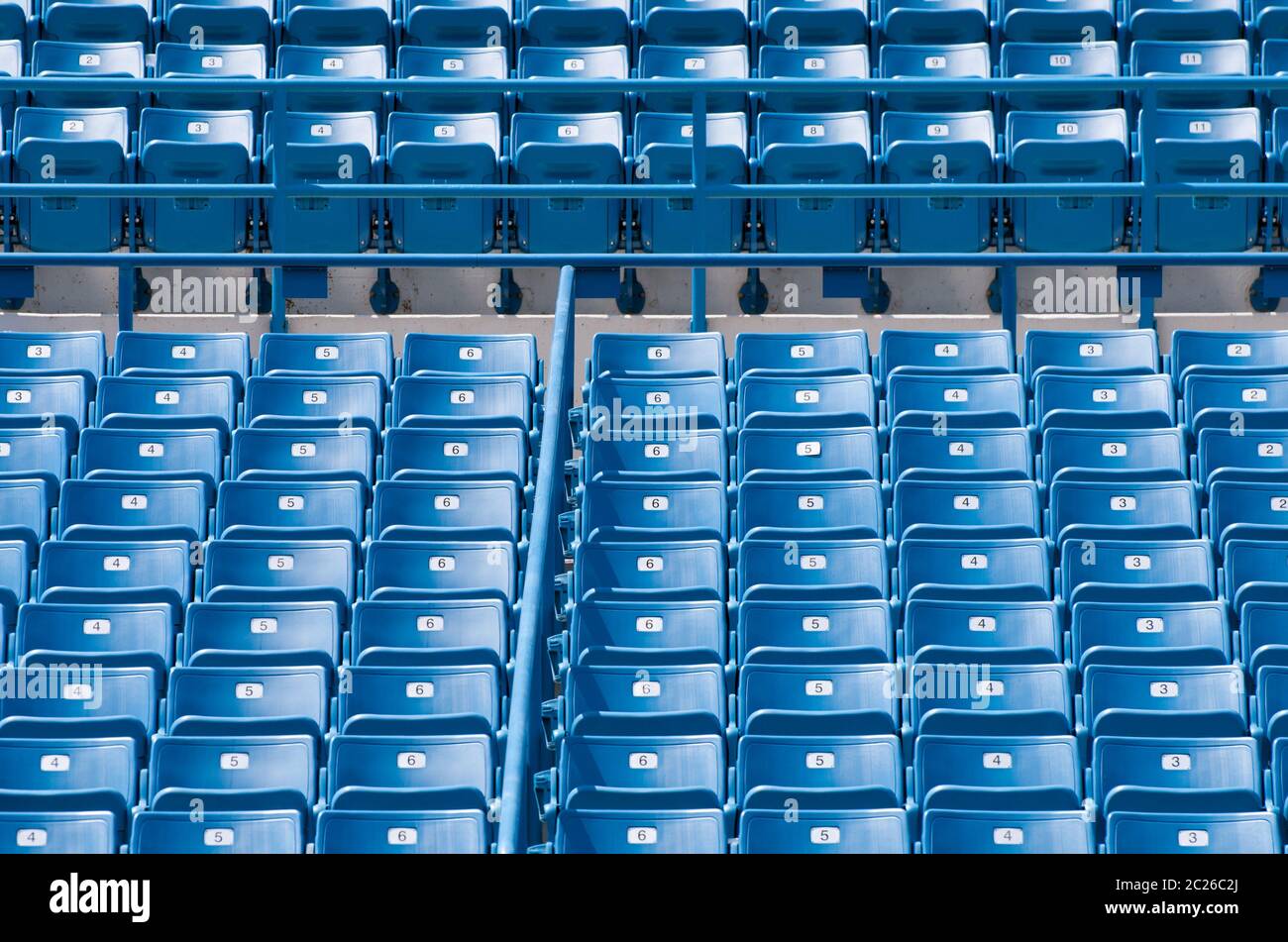 Blue seats in a sports stadium. Stock Photo