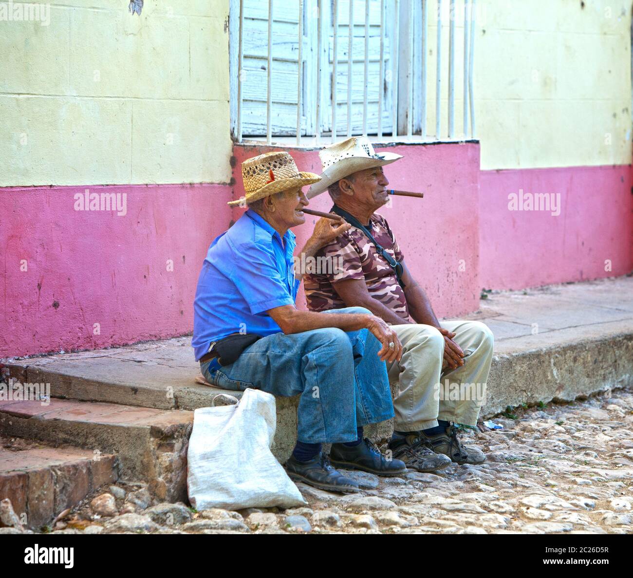 CUBA- FEBRUARY 04, 2013: two elderly Cubans with cigars Stock Photo