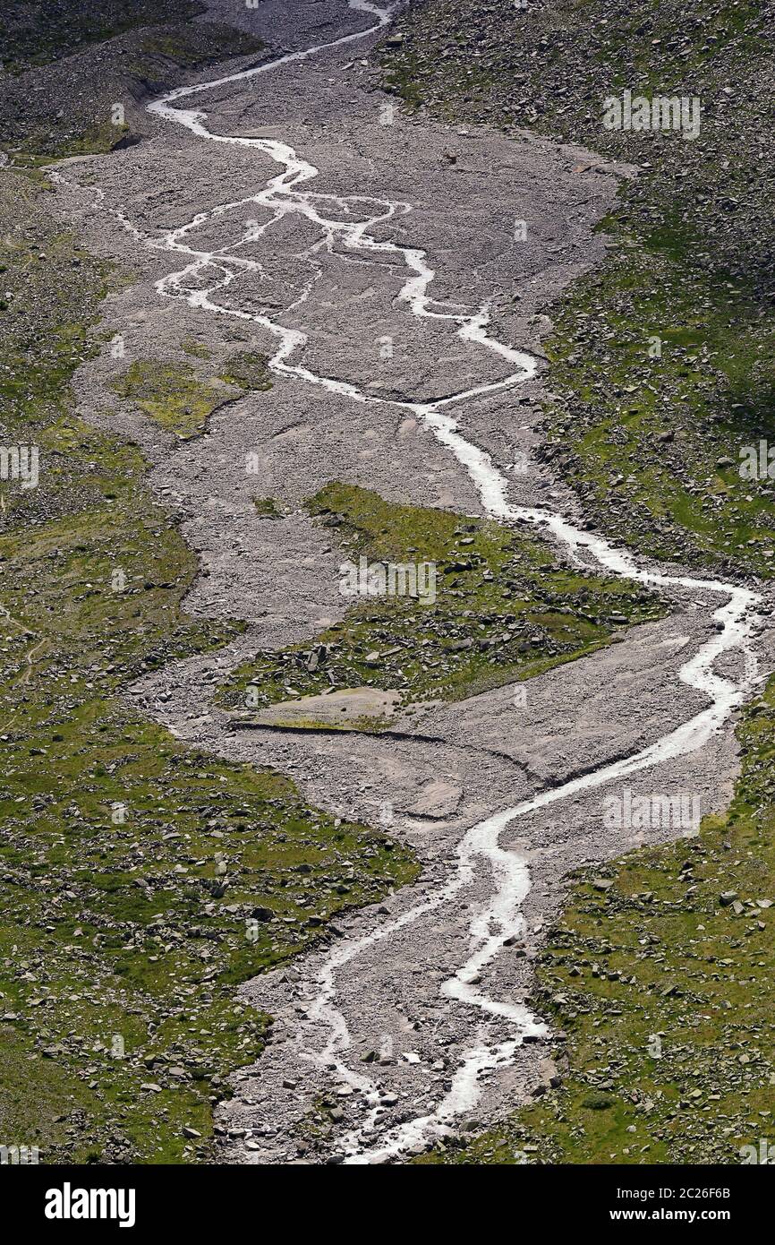 Ã–denwinkelkees with glacier stream in the Hohe Tauern Stock Photo