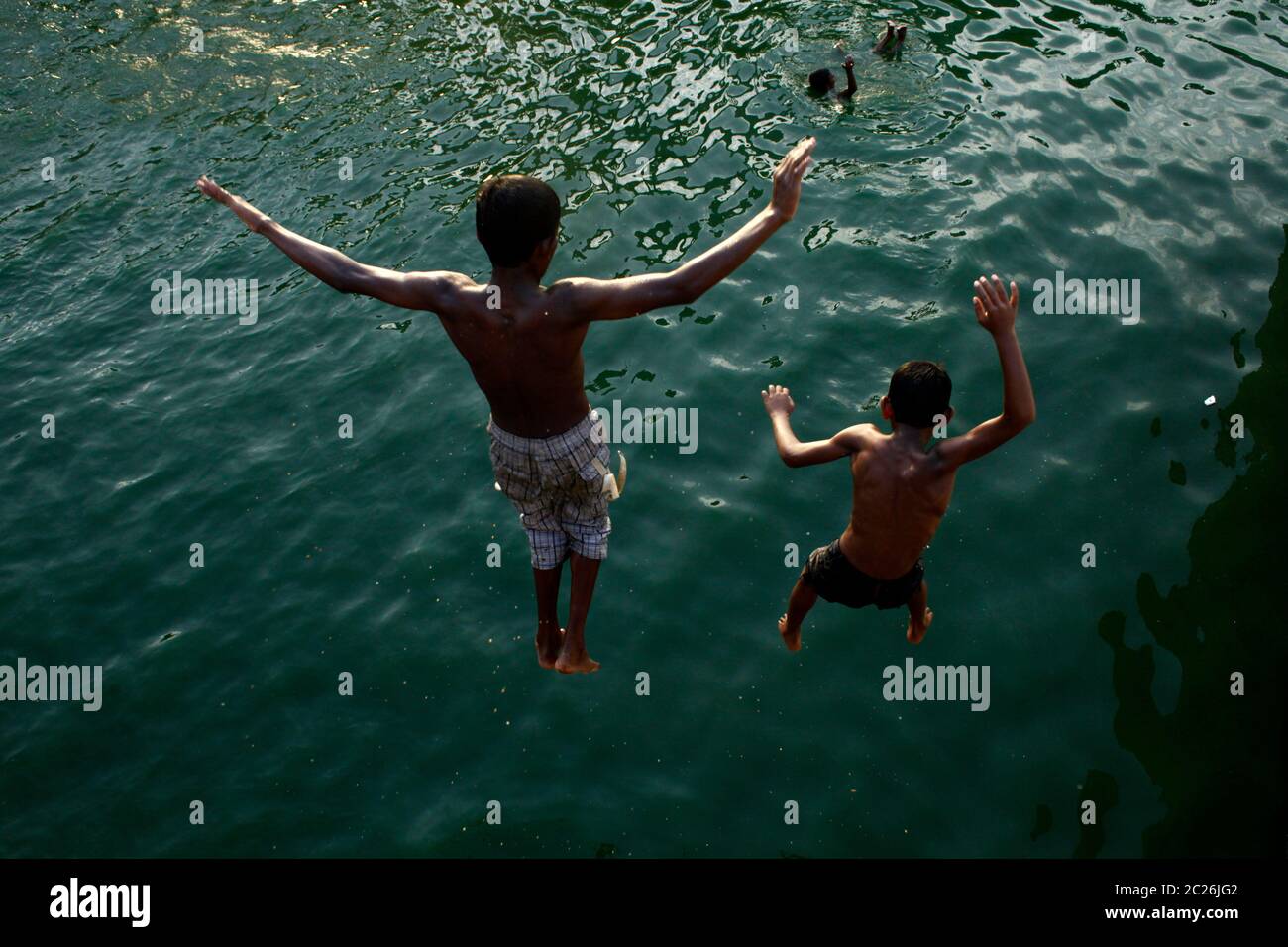 Dhaka,Bangladesh 09th May 2014; Children are enjoying hot summer ...