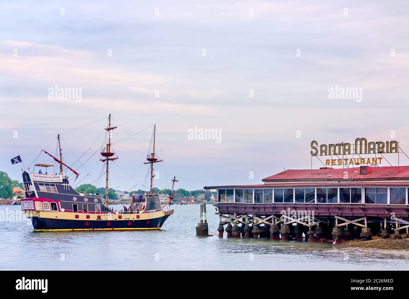 The Black Raven pirate ship takes tourists on a rum runners cruise near the Santa Maria restaurant, April 10, 2015, in St. Augustine, Florida. Stock Photo
