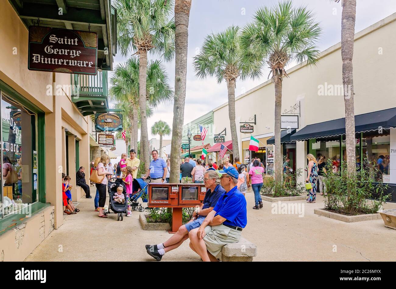 Tourists explore the shops on St. Street, April 11, 2015, in St