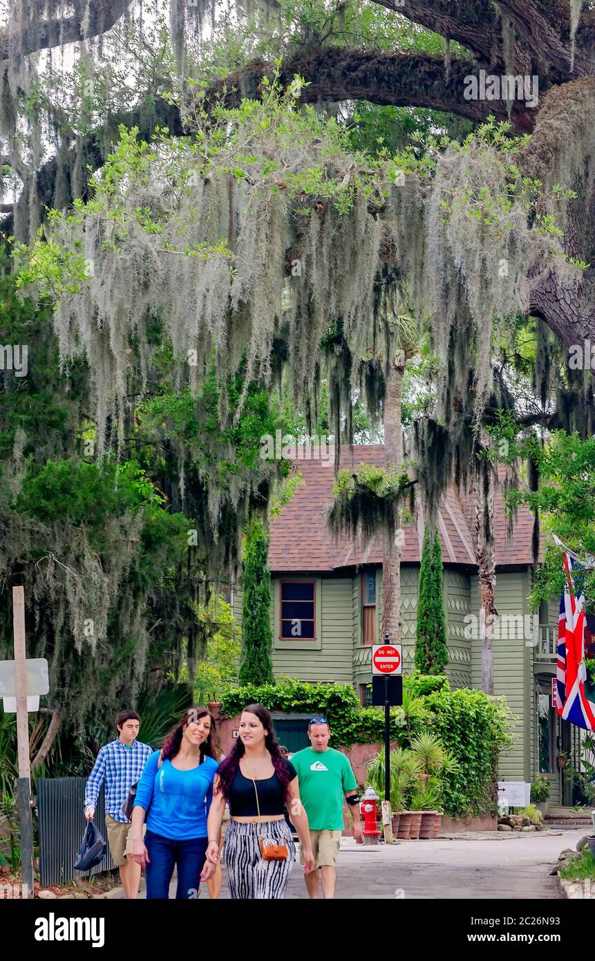 Tourists walk along Cuna Street, April 11, 2015, in St. Augustine, Florida. The pedestrian-only street feature shops and boutiques. Stock Photo