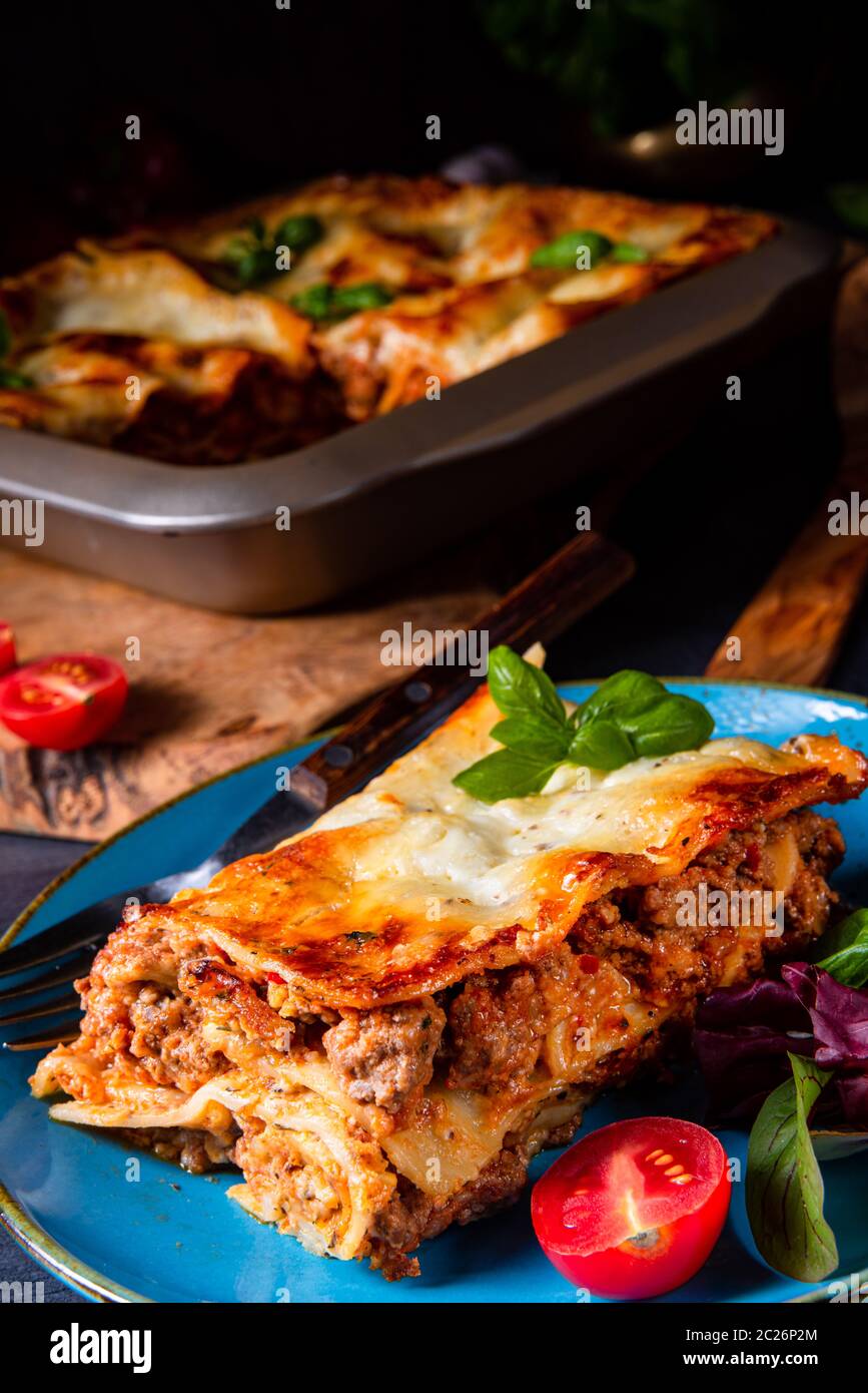 spicy lasagne with tomato sauce and basil Stock Photo Alamy