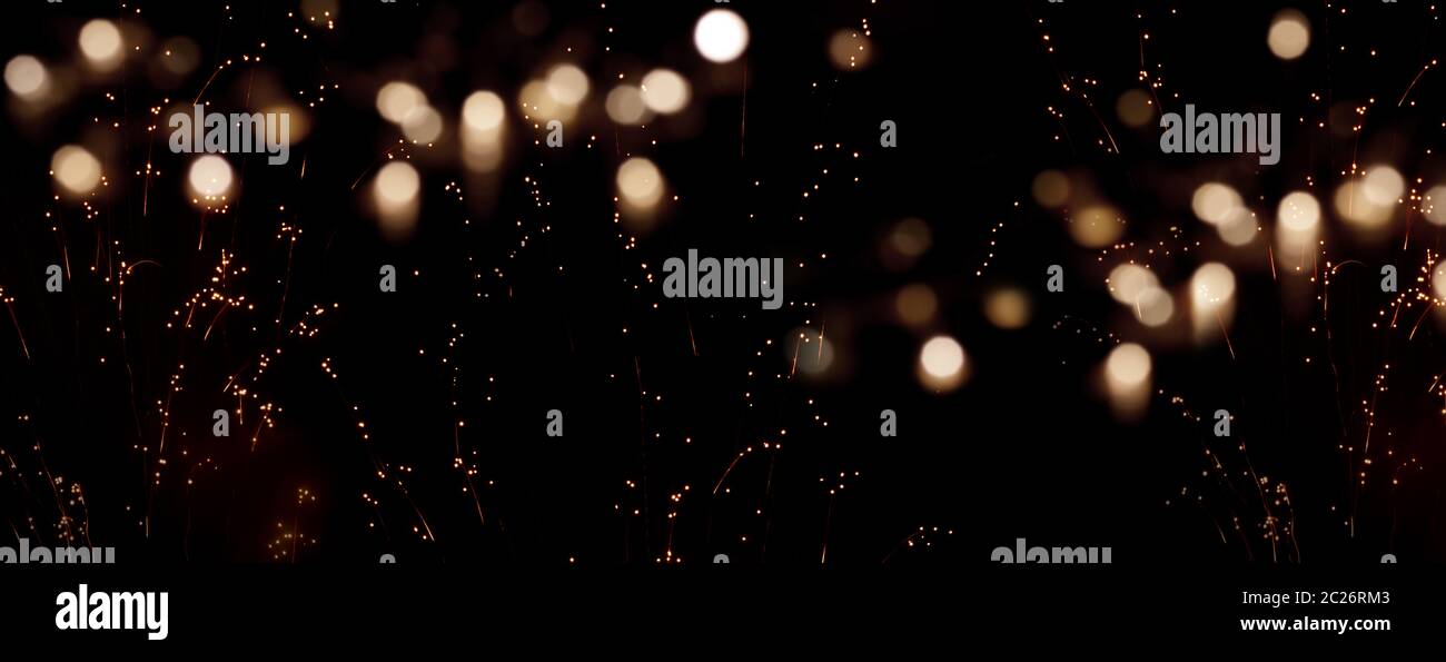 Background with golden fireworks on night sky for the new year Stock ...
