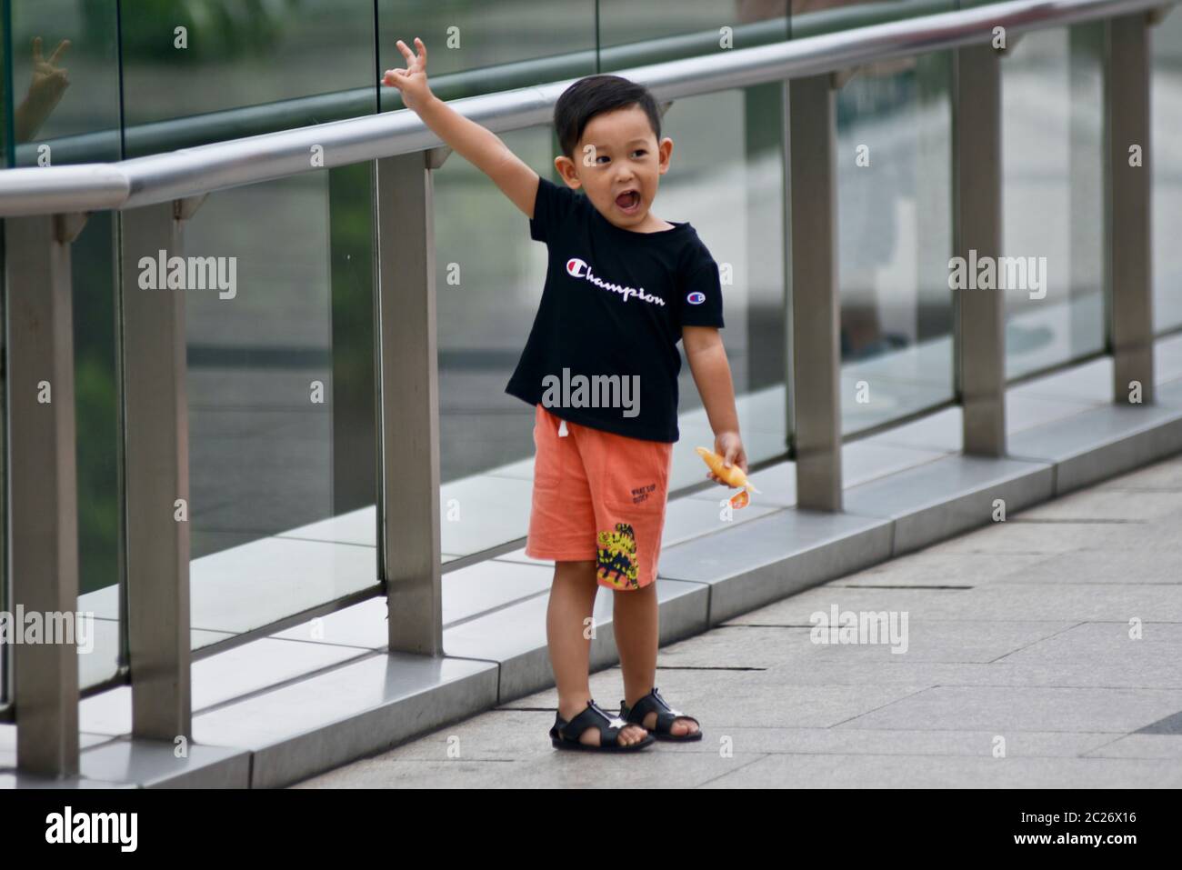 A happy chinese toddler in Shanghai Pudong district. China Stock Photo