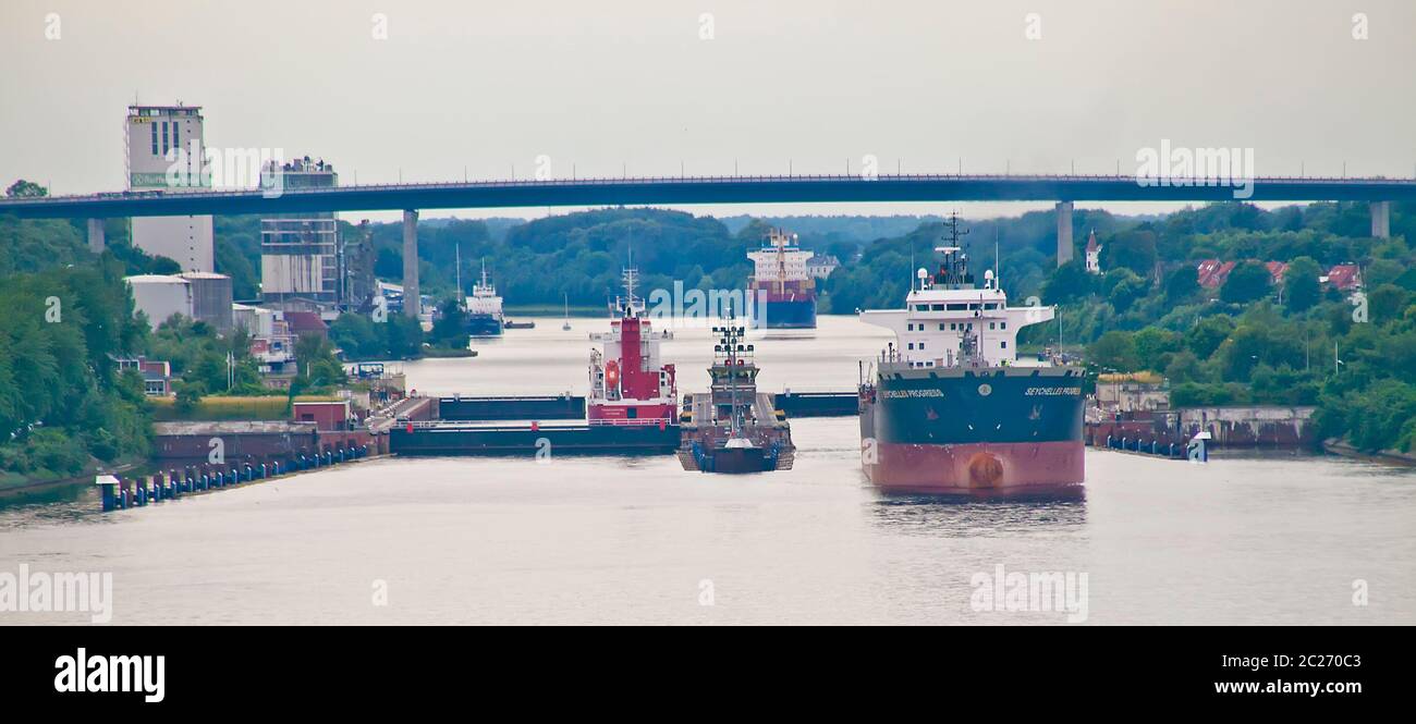 Ships navigating the Kiel Canal, Schleswig-Holstein, Germany Stock Photo
