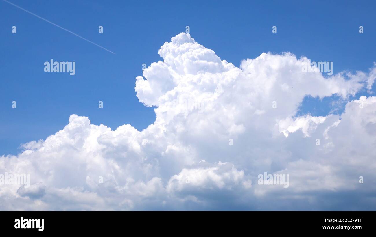 Cumulus congestus pileus cloud background Stock Photo