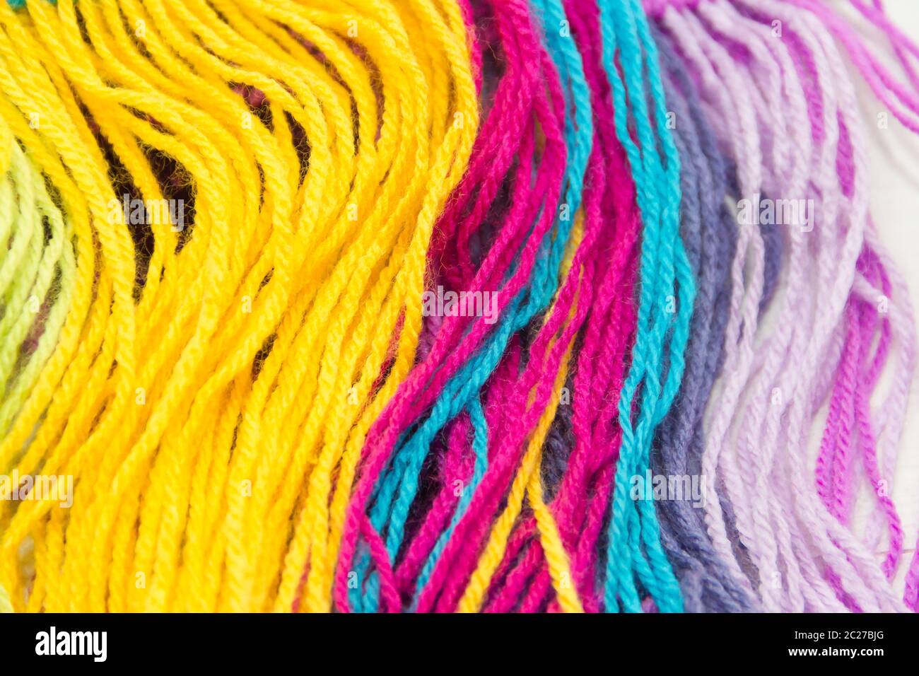 textured background of colorful woolen threads Stock Photo - Alamy