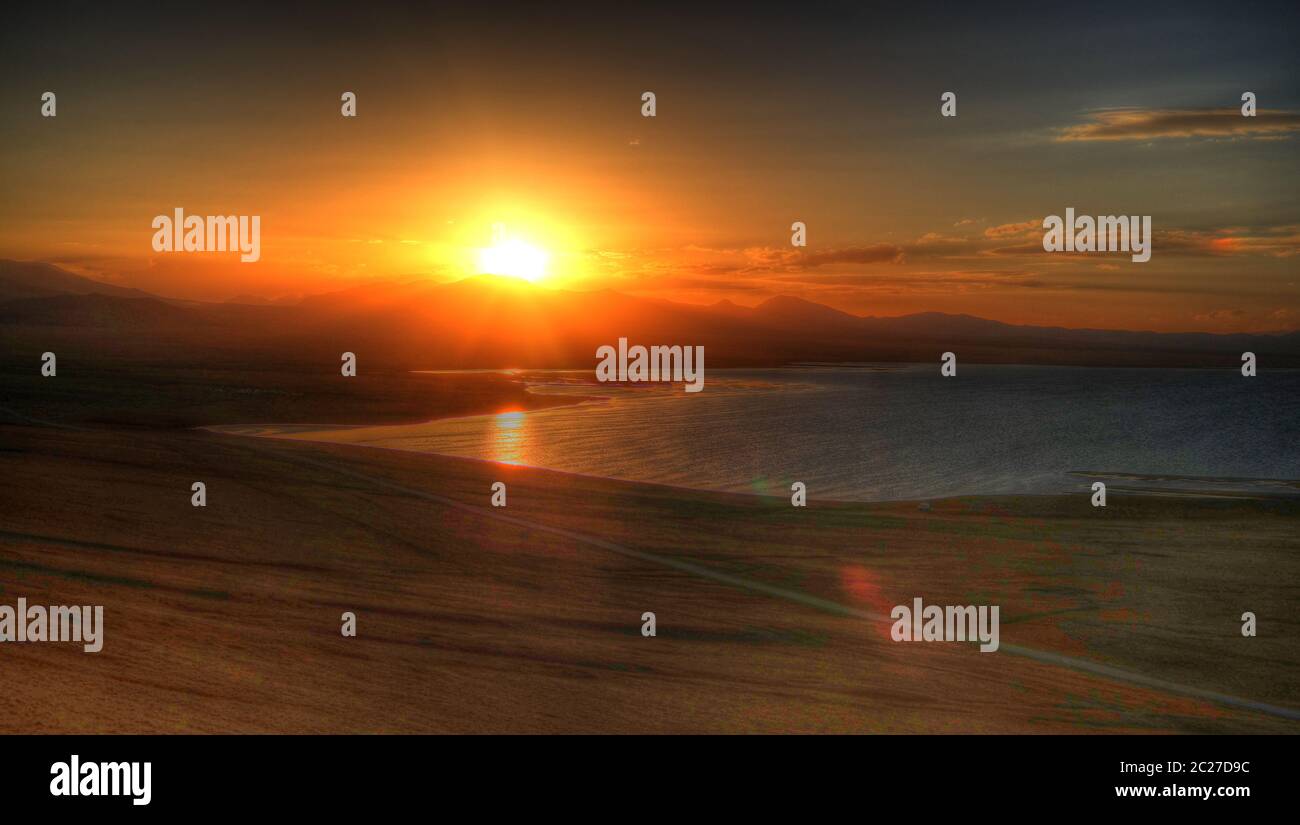 Panorama of Song Kul lake at the sunset, Kyrgyzstan Stock Photo