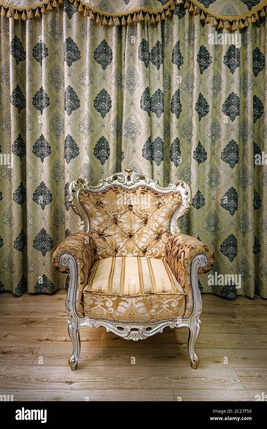 Old armchair in the room Stock Photo - Alamy