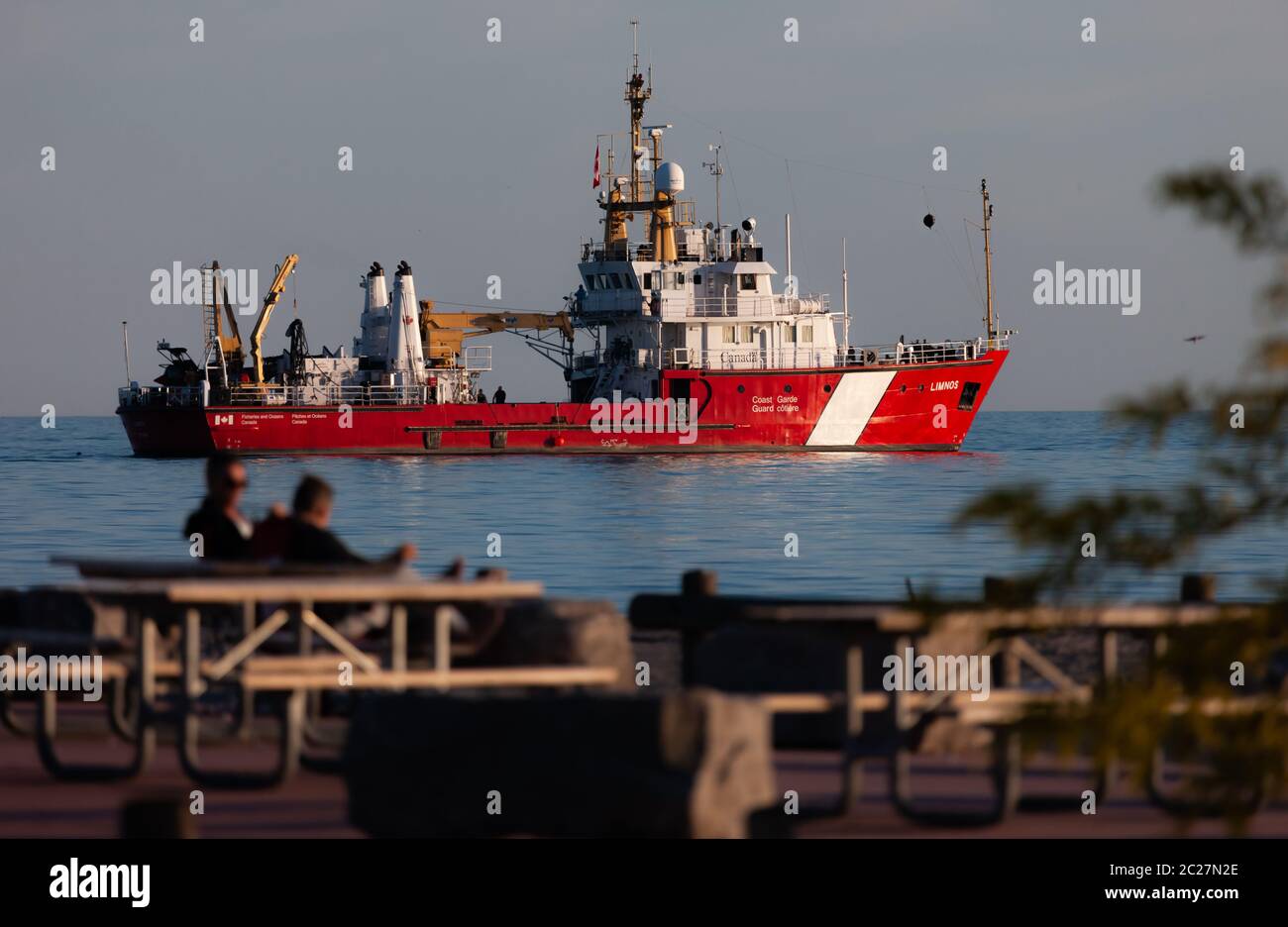 Port Stanley, Canada - June 16, 2020. The Canadian Coast Guard Ship Limnos sits anchored on Lake Erie off the beach at Port Stanley while the ship and crew conduct training exercises. Mark Spowart/Alamy Live News. Stock Photo