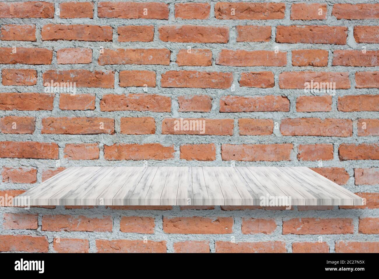 Decorative shelf on white brick wall with flowers in vase on it Stock ...