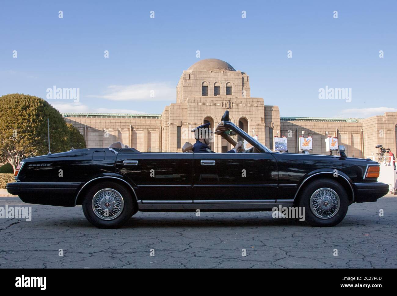 An old convertible Japanese police car or patrol car in front the Meiji Memorial Picture Gallery in Shibuya, Tokyo, Japan. Stock Photo