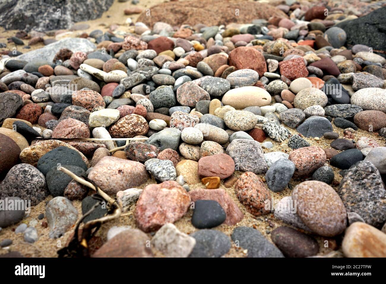 Abstract Smooth Round Pebbles on a Beach Stock Photo