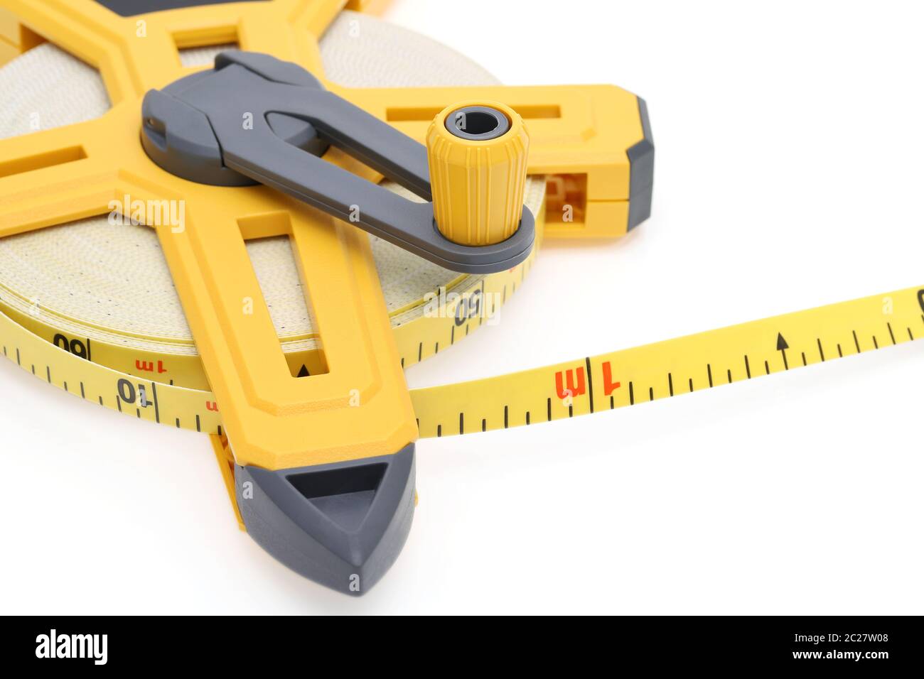 Industrial measuring tape surveying on a white background Stock Photo