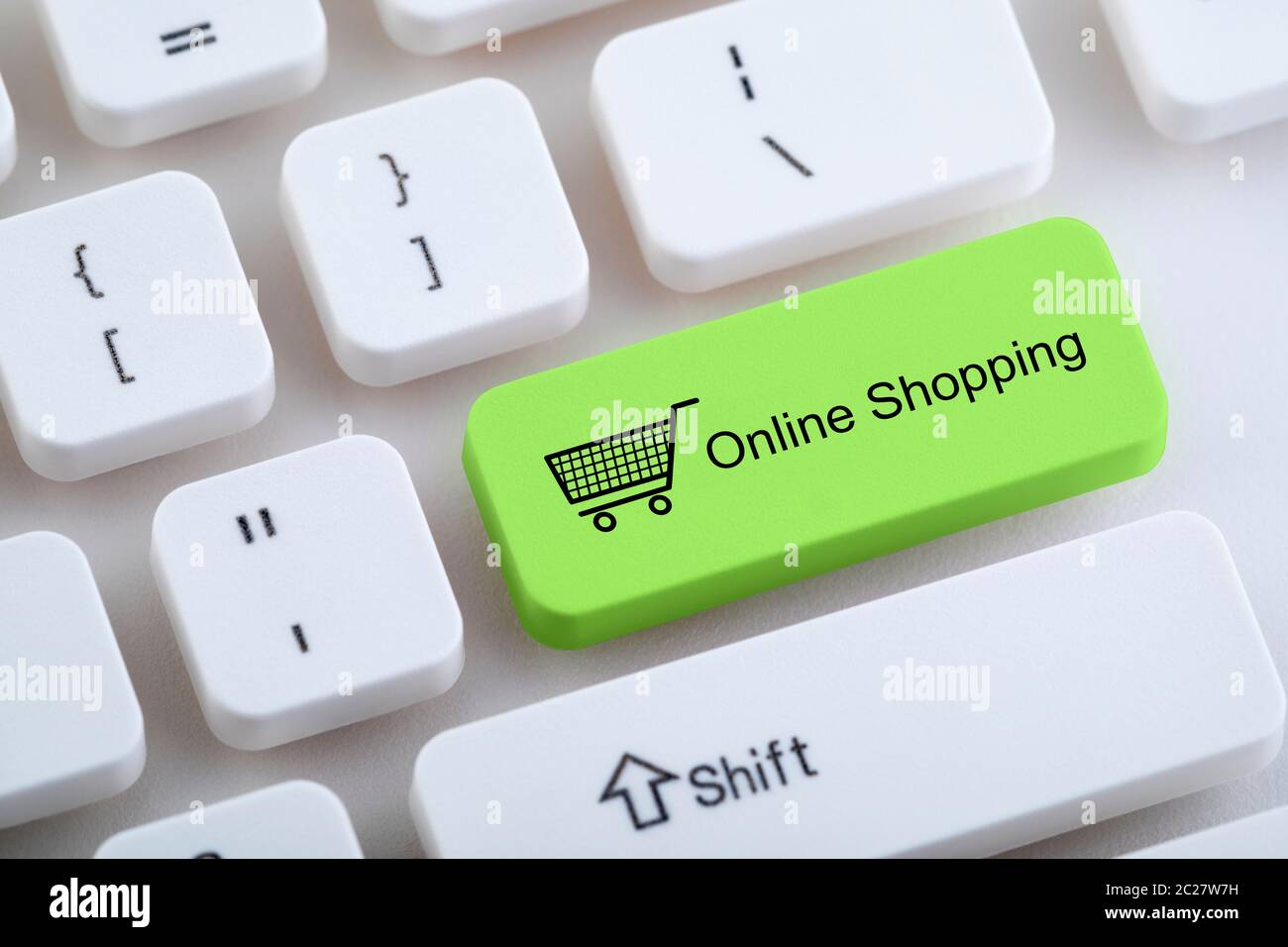 Computer keyboard with online shopping button Stock Photo