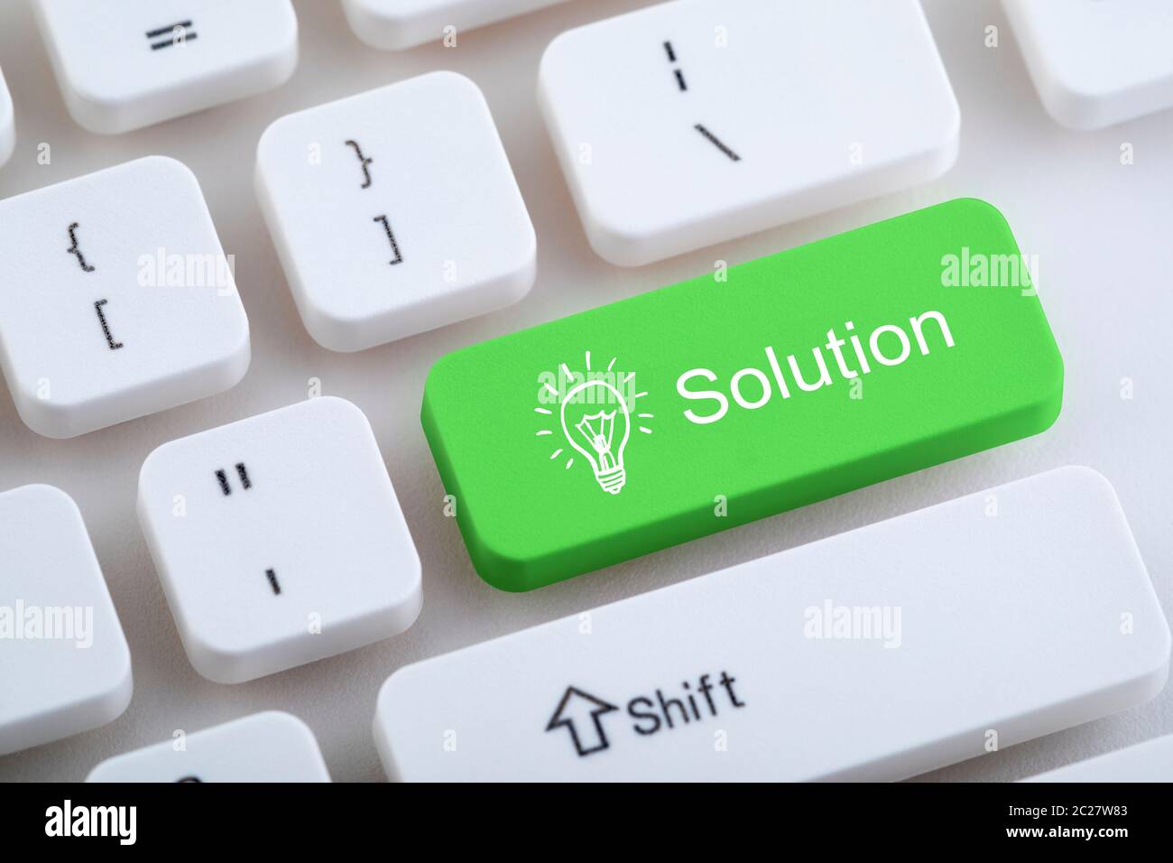 Computer keyboard with solution button Stock Photo