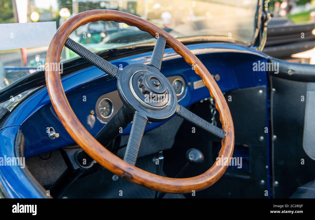 a vintage car detail, antique car steering wheel Stock Photo - Alamy