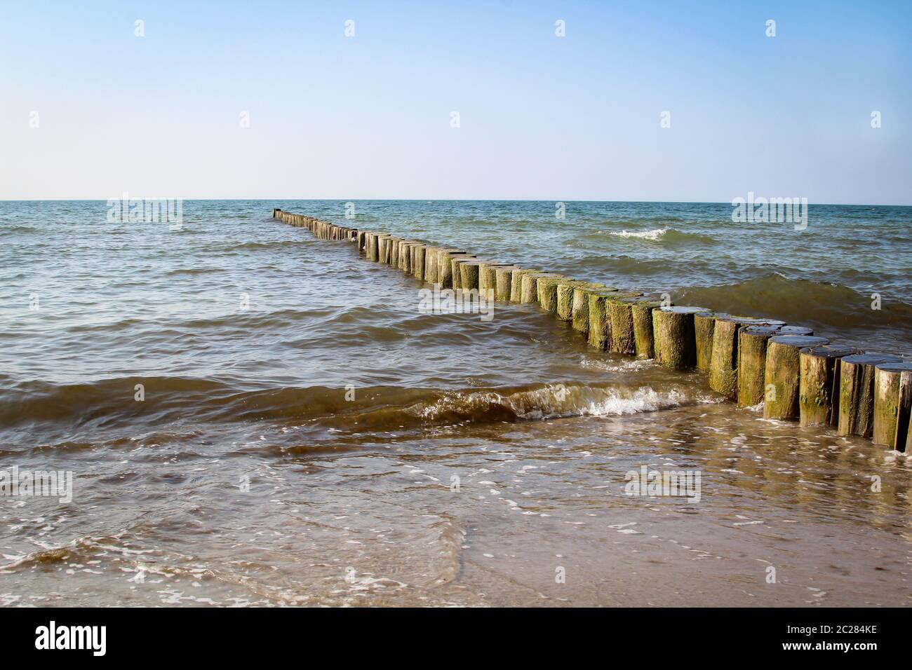 Breakwater built of wooden logs by the Baltic Sea Stock Photo - Alamy
