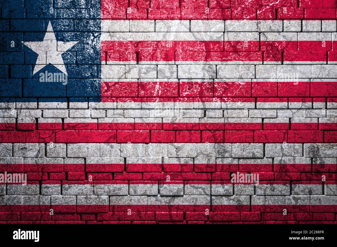 National flag of Liberia on brick wall background.The concept of ...