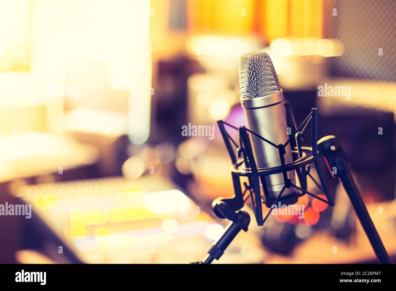 Professional studio microphone, recording studio, equipment in the blurry  background Stock Photo - Alamy