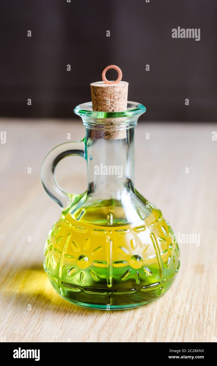Small bottle of olive oil with cork stopper Stock Photo