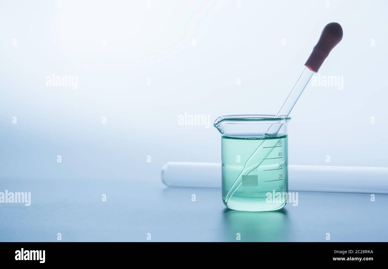 Glass laboratory chemical test tubes with liquid for analytical ...