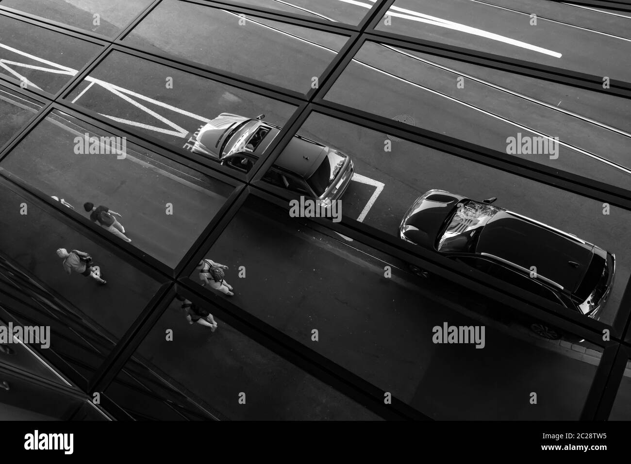 Car Parked on the Street with Glass Reflection in Basel, Switzerland. Stock Photo