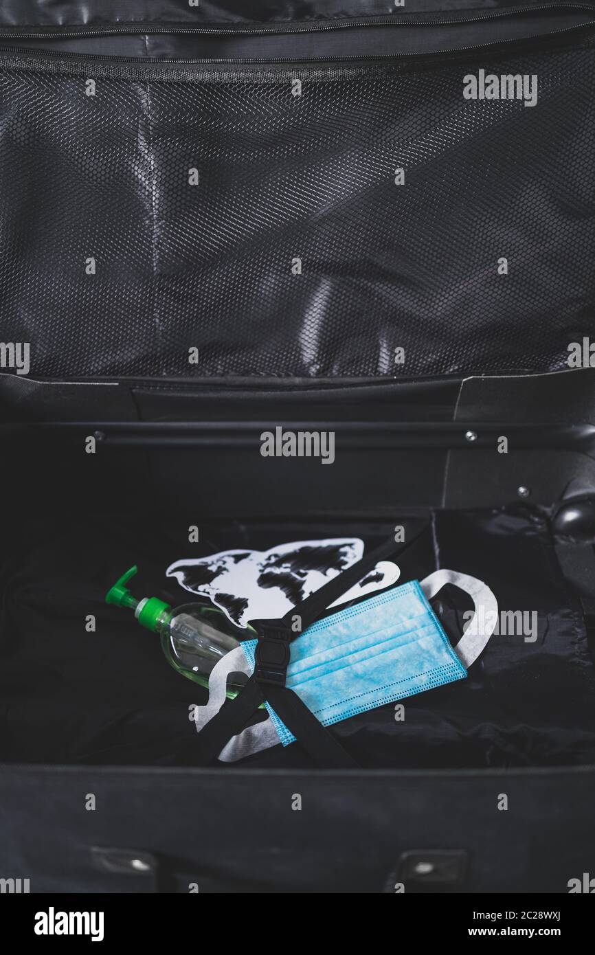 travel industry and flying during covid19, carryon luggage with world