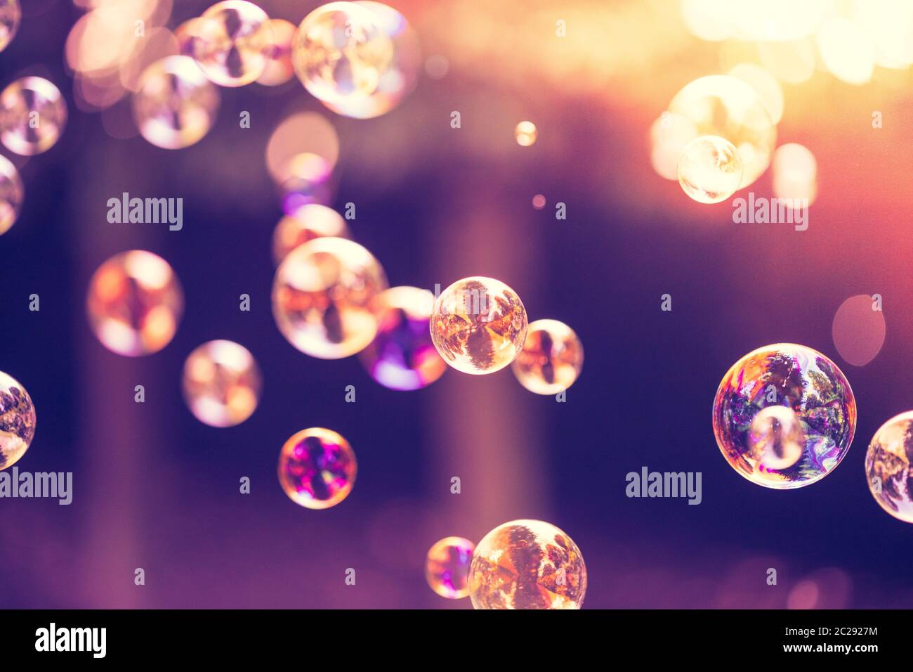 Soap bubbles floating in the air, summer time Stock Photo - Alamy