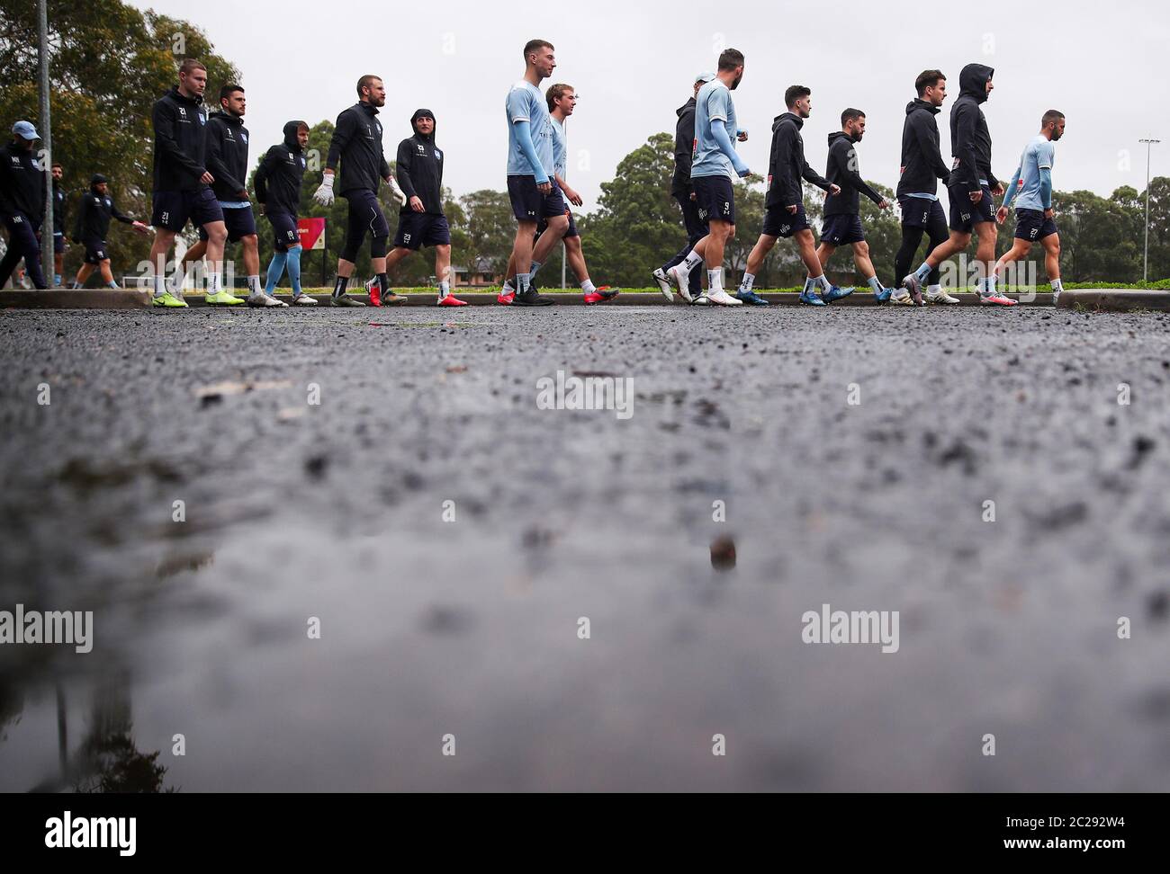 Sydney, Australia. 17th June, 2020. Players of Sydney FC arrive before a training session at Macquarie University in Sydney, Australia, on June 17, 2020. Australia's highest-level professional men's soccer league A-league is set to resume on July 16 with Melbourne Victory taking on Western United at AAMI Park in Melbourne. Credit: Bai Xuefei/Xinhua/Alamy Live News Stock Photo