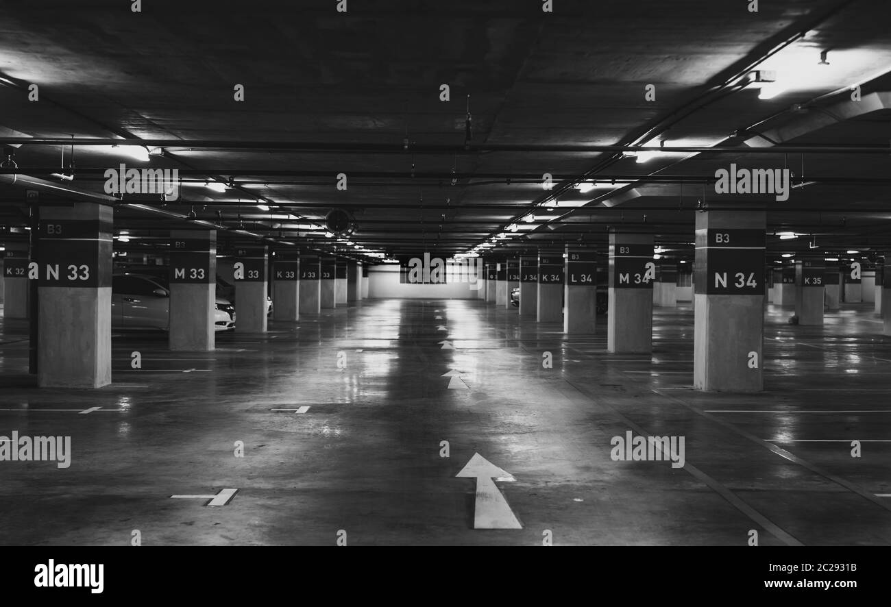 Underground car parking lot. Underground car parking garage at shopping