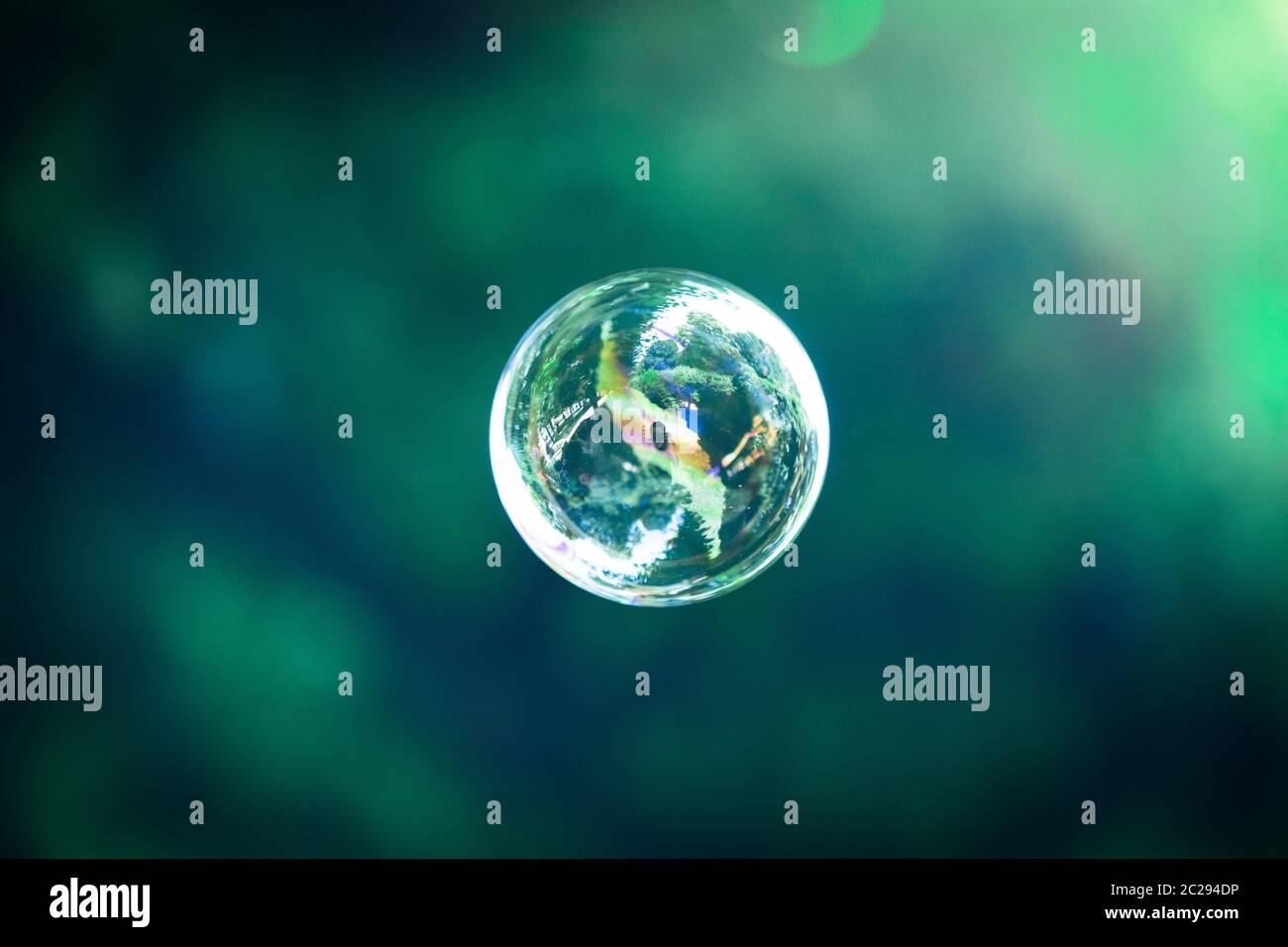 Soap bubbles floating in the air, summer time Stock Photo