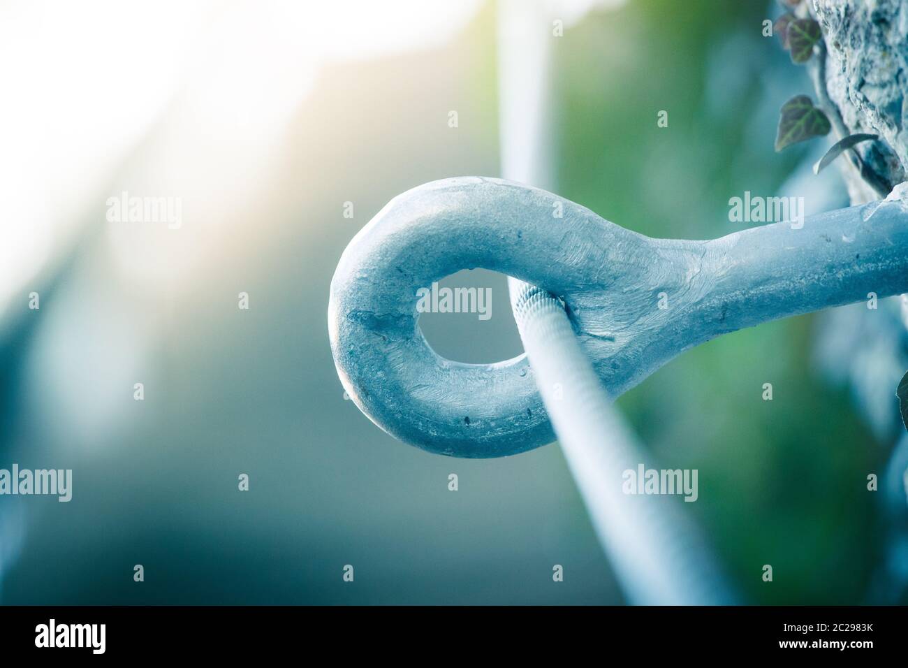 Iron piton in a rock, climbing sports Stock Photo Alamy