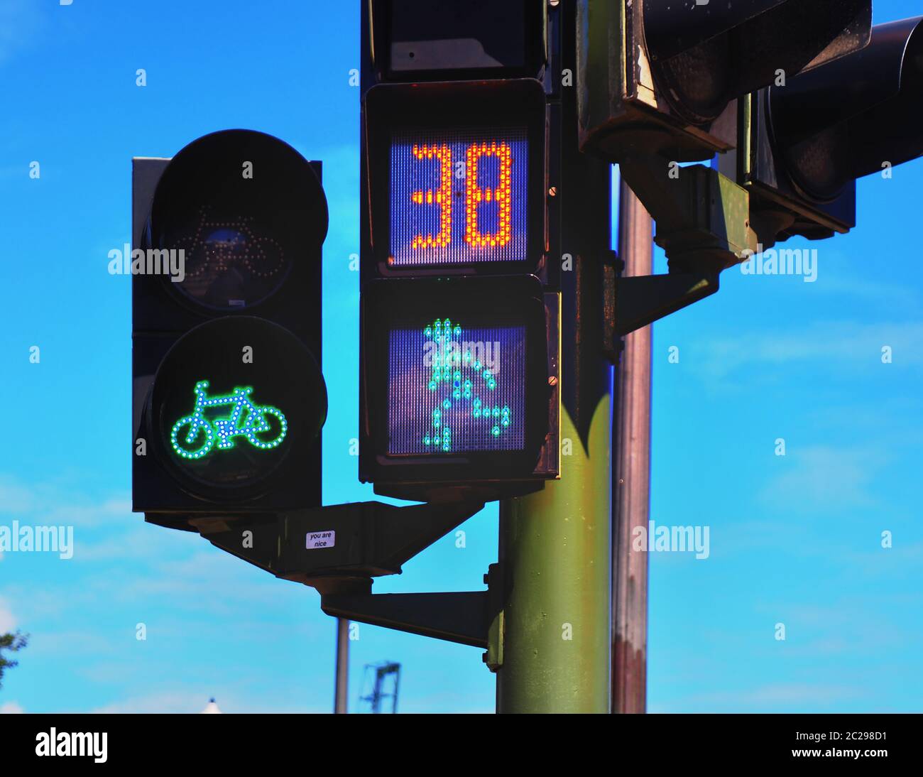 Traffic light with running green traffic light man and over it a second indication Stock Photo