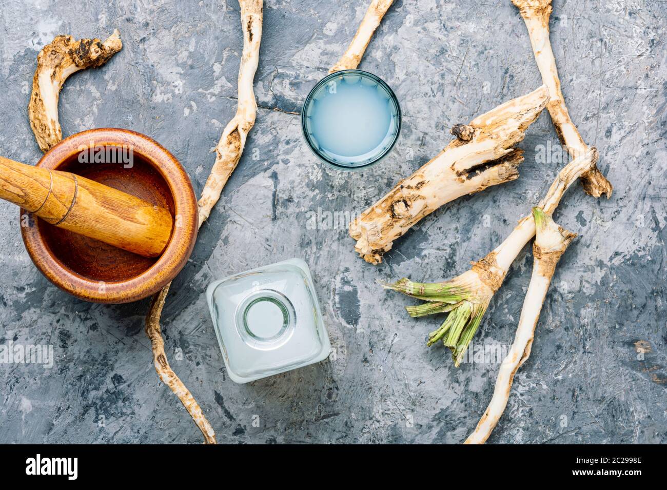 Traditional alcoholic drink from horseradish roots.Fresh horseradish