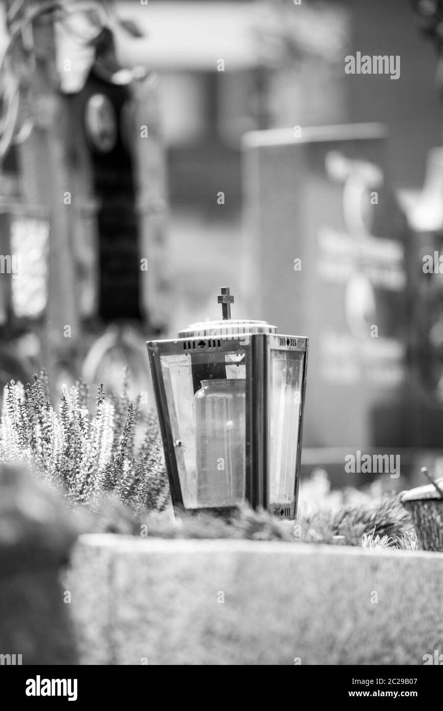 Candle / lantern at the cemetery, funeral, sorrow Stock Photo