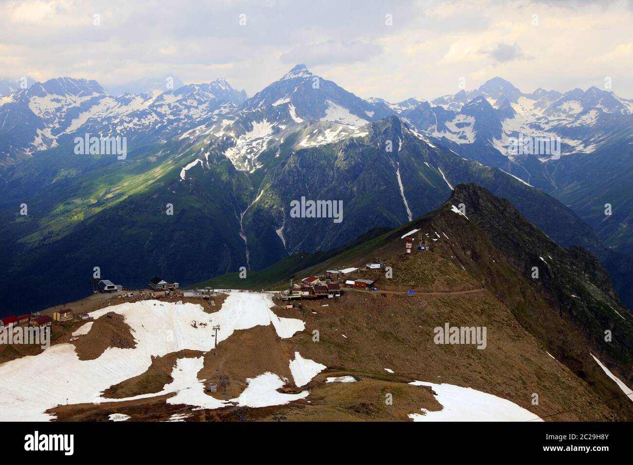 Mountains scene with dramatic blue sky in national park of Dombay Stock Photo