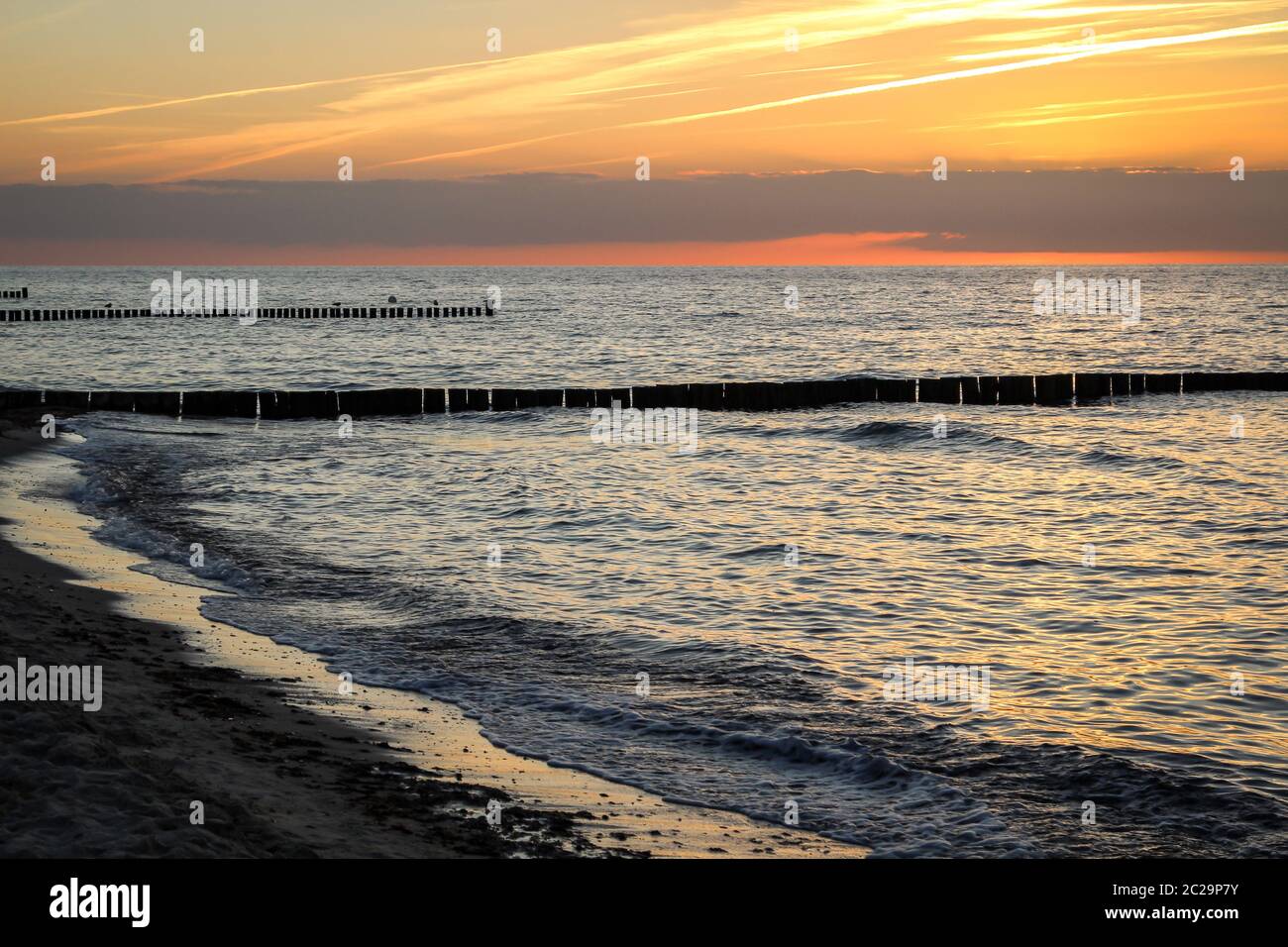 Breakwater built of wooden logs by the Baltic Sea Stock Photo - Alamy