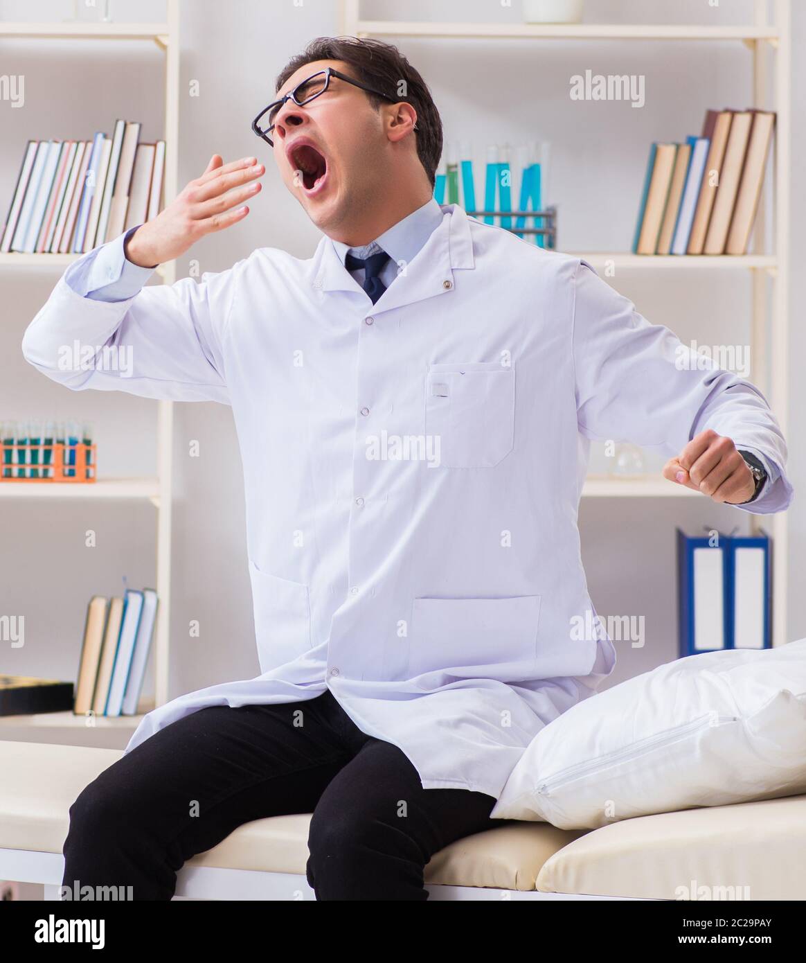 Doctor relaxing after complex surgery in hospital Stock Photo - Alamy