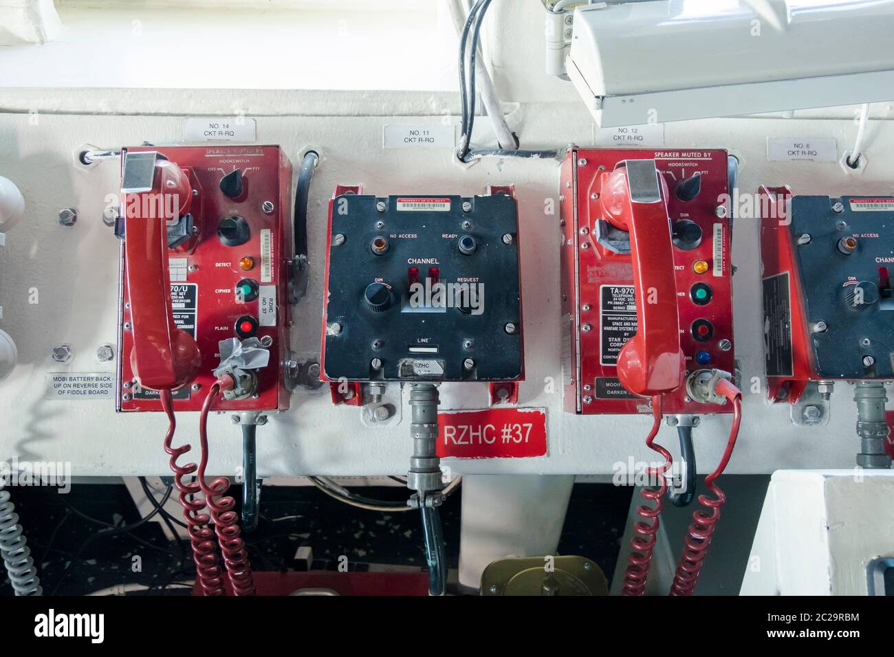 A close up, detail of the red phones on the bridge of the USS Navy Donald Cook. On an official ship visit in Klaipėda, Lithuania. Stock Photo